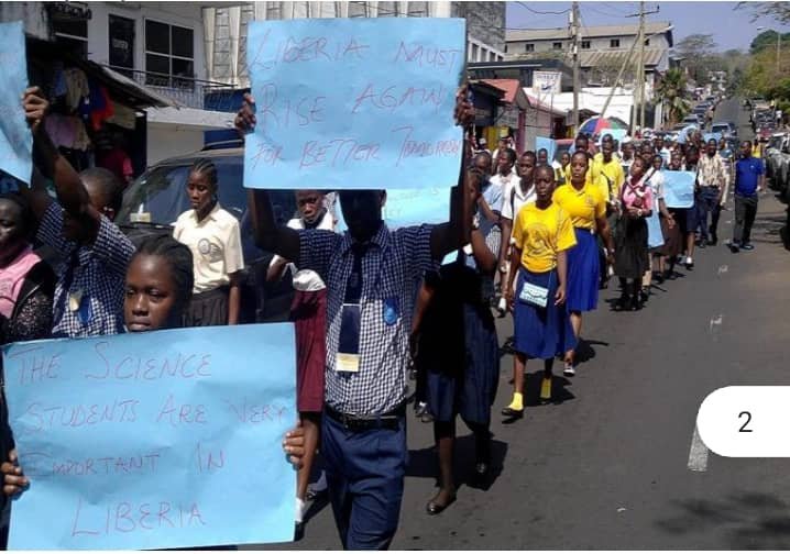 STEM education in Liberia. LESSAT Summit Awareness Parade on the street of Monrovia